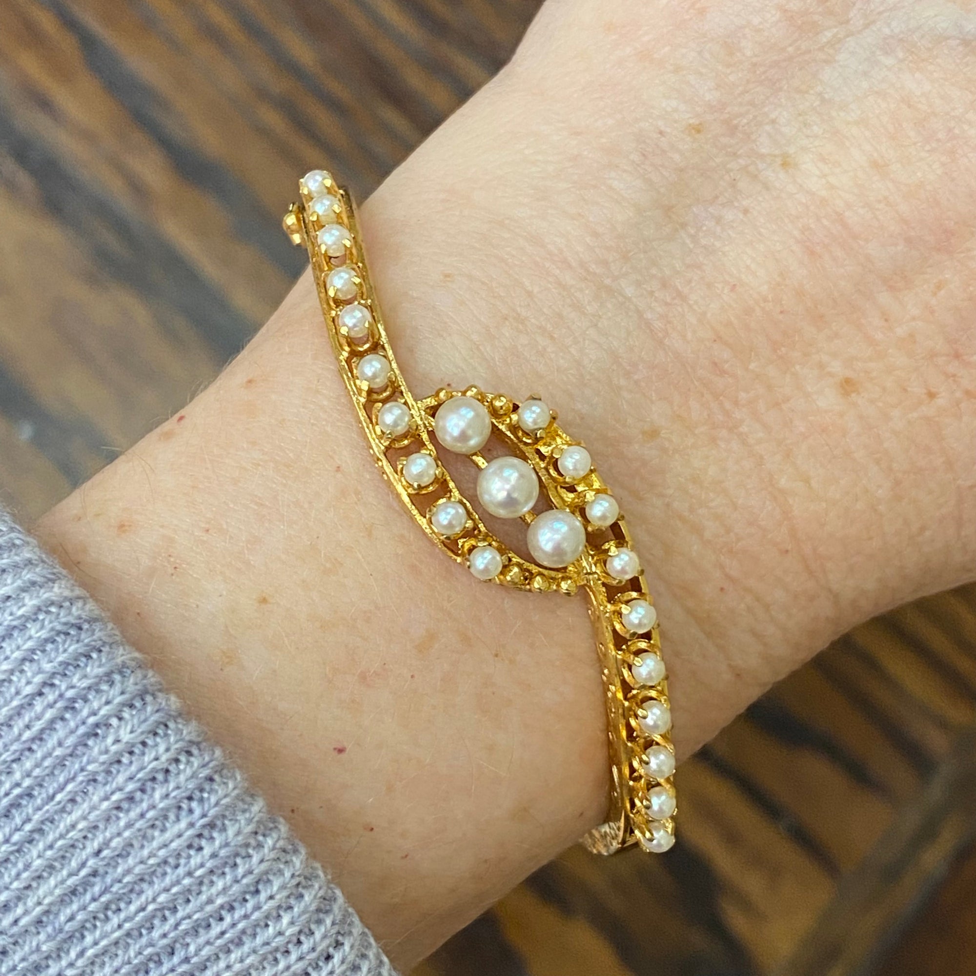 Gold and best sale pearl bangle bracelet
