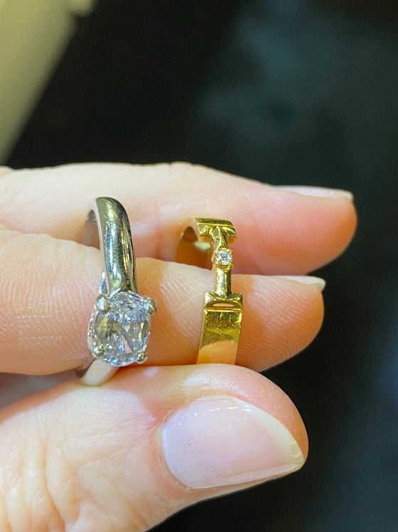 Tiffany & Co diamond band and

Platinum diamond solitaire ring oval: 0.66ct E/VVS2