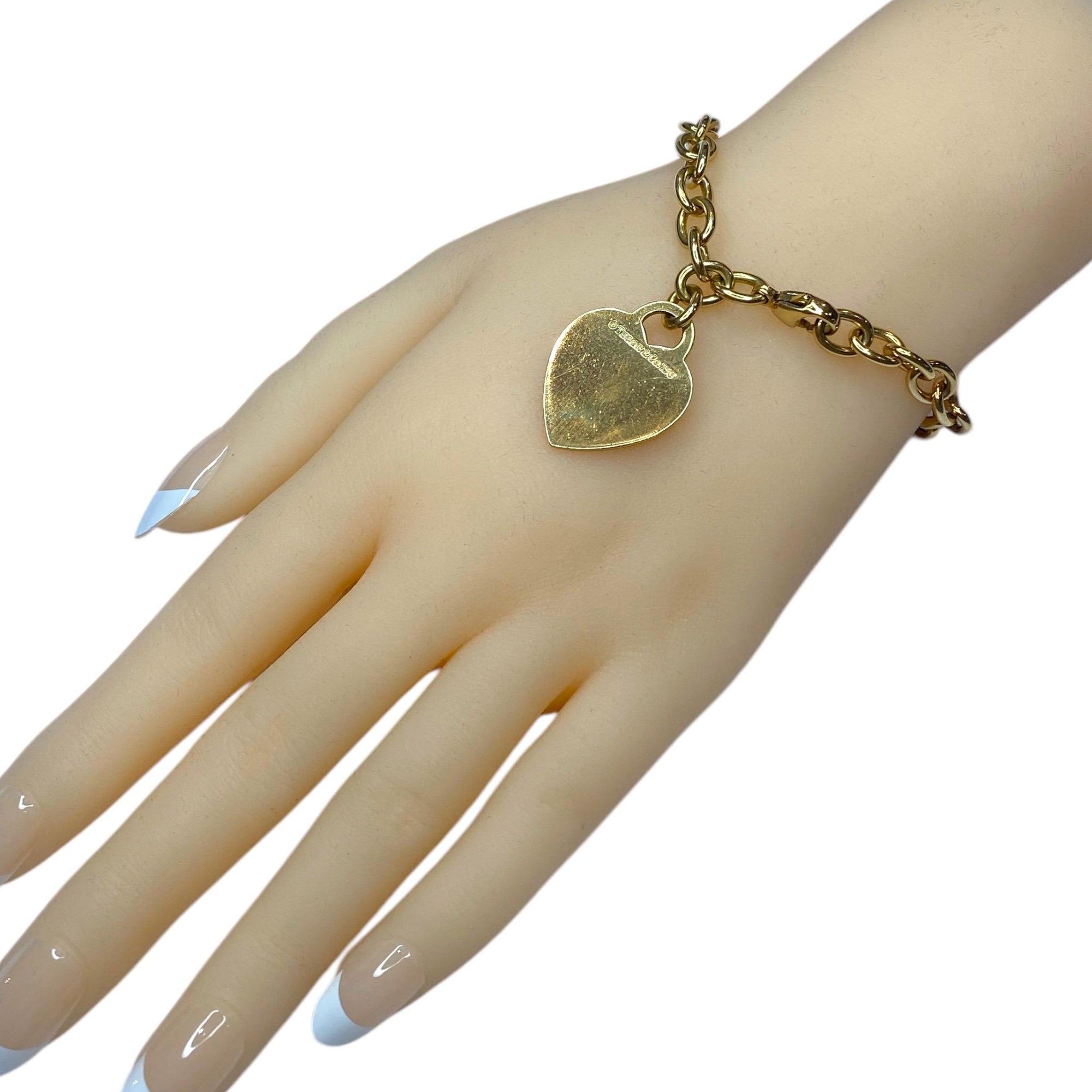 TIFFANY & Co. 18K Gold Heart Tag Charm Bracelet 7"